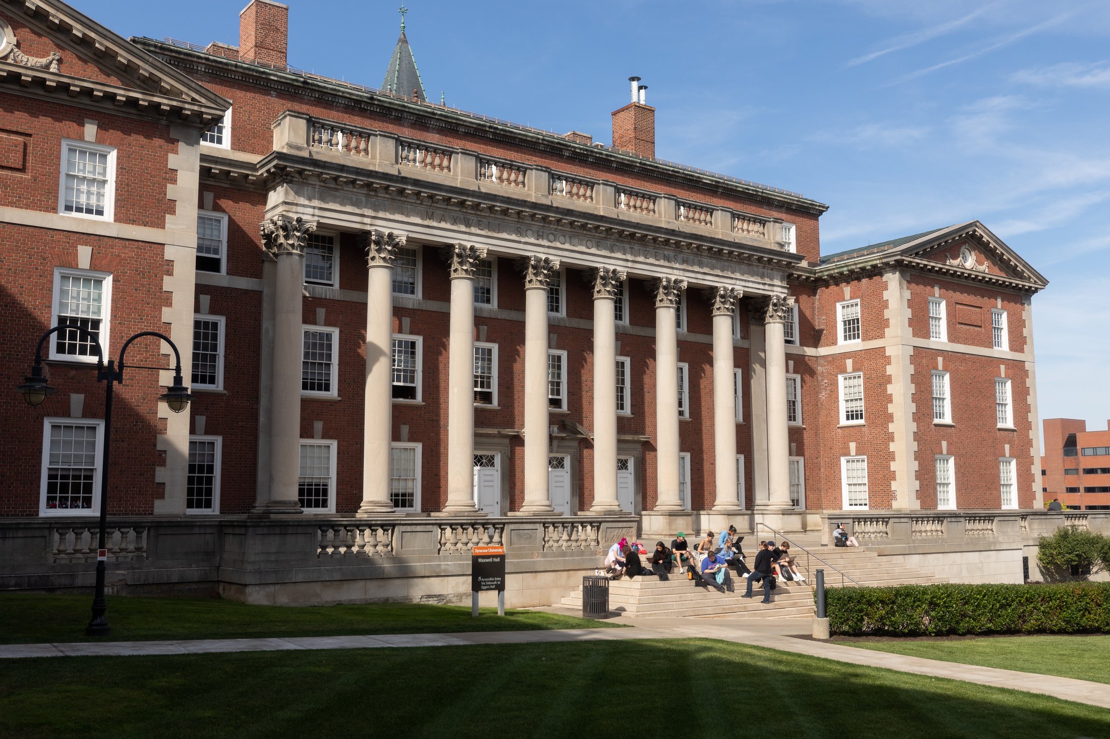 Students taking class outside of Maxwell.