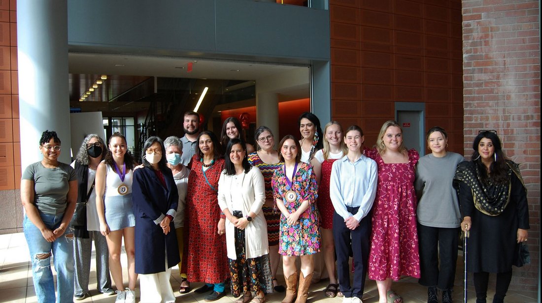 A group of faculty and staff in the women and gender studies department.